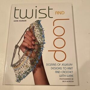 NWT “Twist and Loop,” oversized stiff soft cover